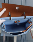 HM HERBAG ZIP 31 SKY AND BRONZE CANVAS