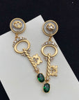 KEY SHAPED DANGLE GG EARRING