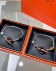 HM BLACK CIRCLE SILVER BRACELET