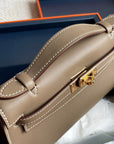 HM Kelly Pochette 22cm Gris Elephant Swift Gold Hardware