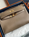 HM Kelly Pochette 22cm Gris Elephant Swift Gold Hardware