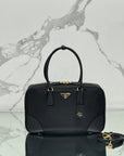 LARGE TOP HANDLE BAG 35 IN BLACK NYLON AND CALFSKIN TRIM