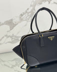 LARGE TOP HANDLE BAG 35 IN BLACK NYLON AND CALFSKIN TRIM