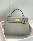 HM KELLY 25CM GRAY TOGO GOLD HARDWARE