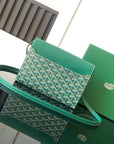 CHYPRE WALLET-POUCH 21 IN GREEN GOYARDINE CANVAS AND CALFSKIN