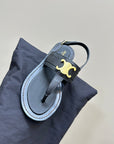 LYMPIA TRIOMPHE THONG IN CALFSKIN BLACK
