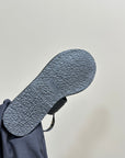 LYMPIA TRIOMPHE THONG IN CALFSKIN BLACK