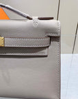 HM KELLY POCHETTE 22CM GREY SWIFT GOLD HARDWARE